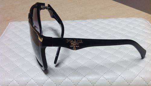 Brand new authentic PRADA SPS67N sunglasses for man in factory box. bobshop .za
