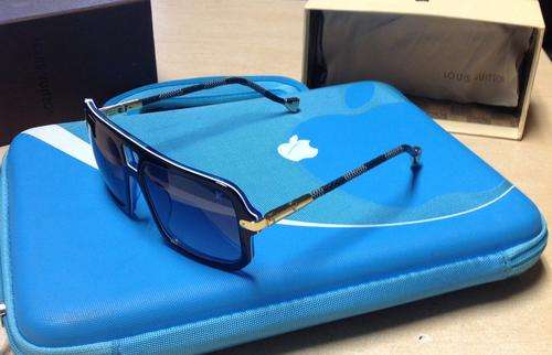 Brand new authentic LOUIS VUITTON MOD.K20/W sunglasses for man in factory box.