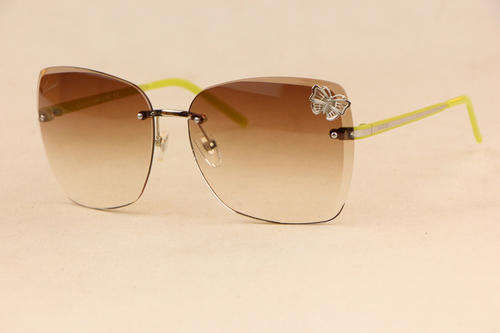 Brand new GUCCI  rimless Yellow-legged metal butterfly gradient lens sunglasses.
