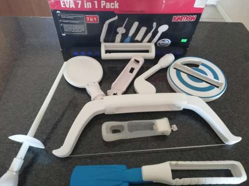 Wii 7 in 1 Combo pack for Wii Sports and Resort with motion plus attachment (Wii)