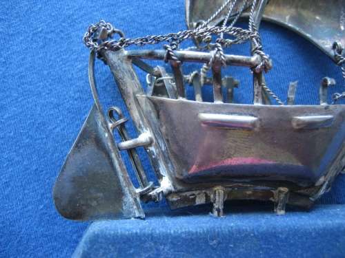 Sterling Silver Model of an Arabian Dhow stamped 925 on Blue Felt Plinth