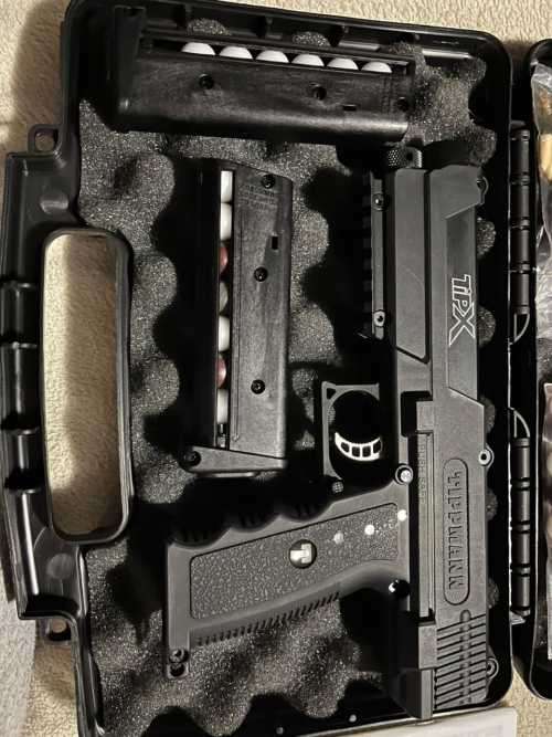 Tippmann TipX True-Feed .68 Caliber Gas, Pepper and Paintball Gun complete with additionals