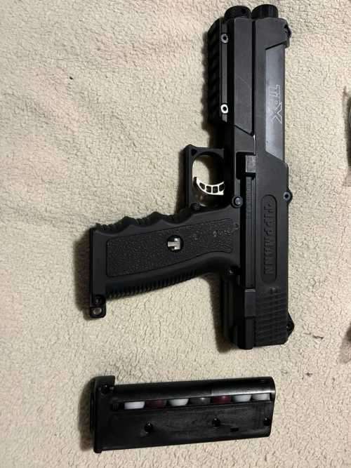 Tippmann TipX True-Feed .68 Caliber Gas, Pepper and Paintball Gun complete with additionals