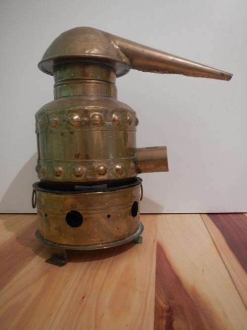 Brass distiller