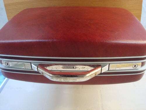 RED SAMSONITE SUITCASE