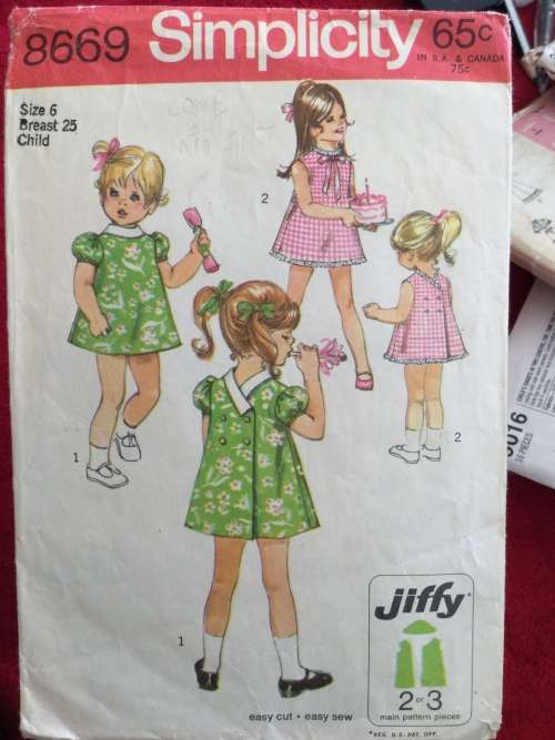 Sewing pattern Simplicity 8669, toddler`s back-wrap dress, size 6