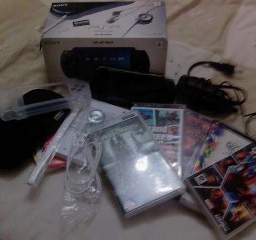 Sony PSP 1000 + games and accessories. Great condition. NEW YEAR 2010 SPECIAL.