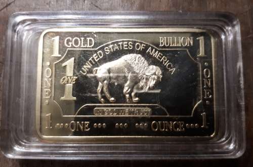 Buffalo Gold Bullion United States of America 1 trony ounce. 100 mills plated gold 1 OZ Coin bar