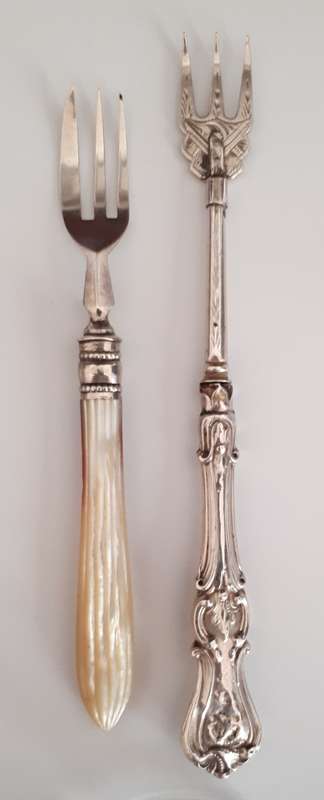 2 silver forks. Please read description