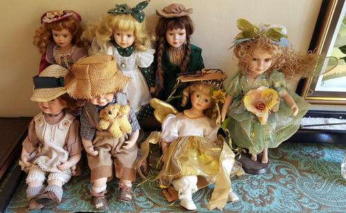 Set of 7 Porcelain dolls