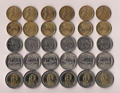 SIX SPECIAL MANDELA COIN SETS.