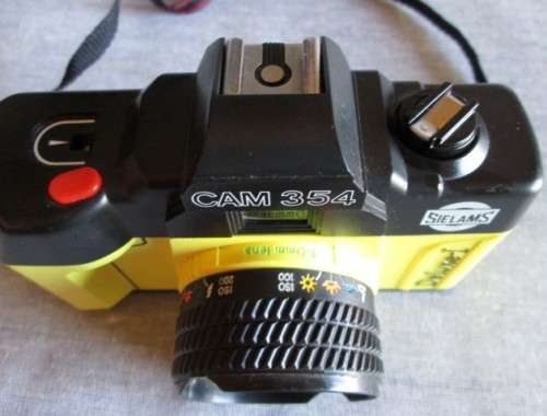 Sielams Deluxe-I Cam354 Auto Focus 50mm lens 35mm Camera yellow Vintage (Untested)