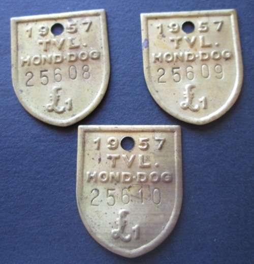 1957 TVL DOG LICENSE TAGS No. 25608/25609/25610 (LOT)