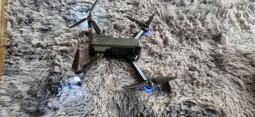SJRC F11 folding drone