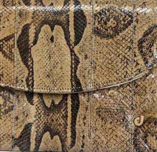 A Ladies snakeskin Clutch Bag by Charles Jourdan