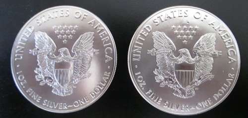 ( LOW START )...TWO .1oz PURE SILVER....AMERICAN EAGLE CROWNS....ONE BID FOR BOTH