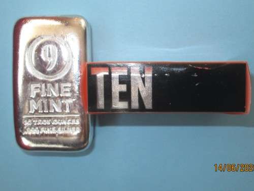 TEN TROY OUNCE     999.9%    PURE SOLID SILVER   DUMPY  BAR.....