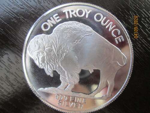 (  LOW START )   (   AMERICAN BUFFALO )   1oz   999.9%   PURE SOLID SIVER..