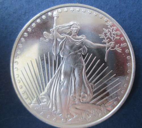 ( LOW START )    AMERICAN LAUREL WREATH   1oz...999.9%....PURE SOLID SILVER