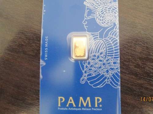 1GRAM   24CT  PURE SOLID GOLD     PAMP SUISSE... AUTHENTICATED AND  CERTIFIED