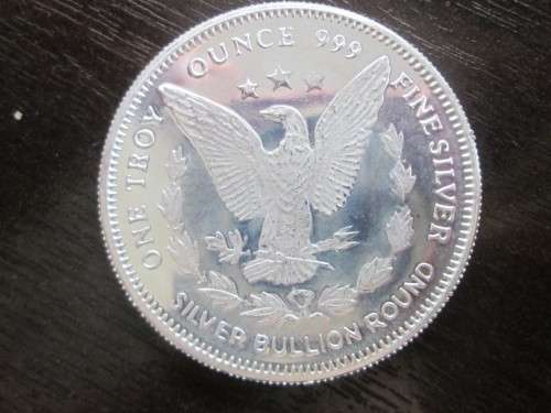 #   PROMO  #      FAMOUS OLD  AMERICAN  MORGAN CURRENCY DESIGN    1oz...999.9%....PURE SILVER.....