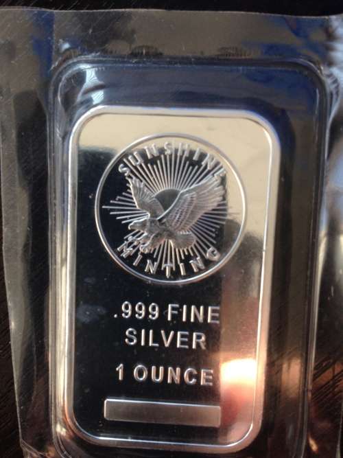 1oz     SUNSHINE    999.9%    PURE SOLID SILVER BAR  STILL COMPLETELY SEALED