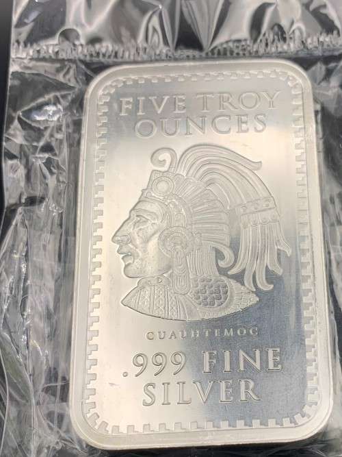 FIVE OUNCE  SILVER BAR OF   THE AZTEC CALENDAR    IN 999.9%  .PURE SOLID SILVER .