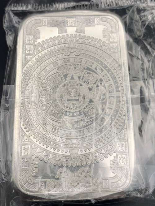 FIVE OUNCE  SILVER BAR OF   THE AZTEC CALENDAR    IN 999.9%  .PURE SOLID SILVER .