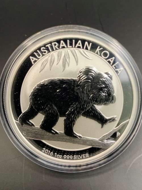 (  QUITE RARE  )  2016    AUSTRALIAN   KOALA BEAR    1oz .PURE SOLID SILVER .  MINTMARKED
