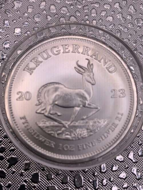 2023 1oz  999.9%  PURE  SOLID SILVER UNC.   KRUGERRAND   CAPSULED