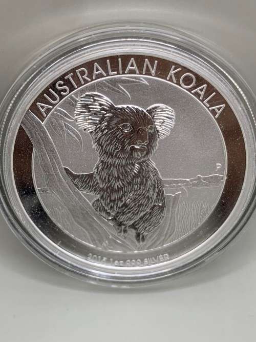 (  QUITE RARE  )  1oz  2015     AUSTRALIAN KOALA BEAR     .PURE SOLID SILVER .    CAPSULED