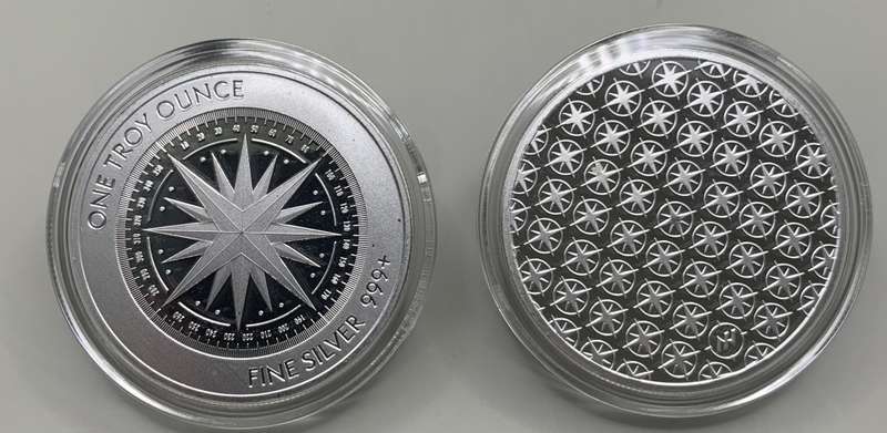 A STRIKING      COMPASS ROSE DESIGN ROUND   1oz   999.9%    PURE  SILVER