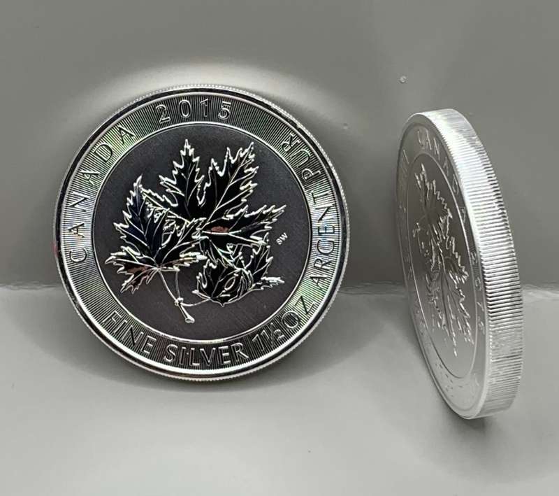 (  1st YEAR  )   2015     ONE AND A HALF OUNCE     MAPLE     MULTI- LEAF     SUPER STRIKE IN SILVER