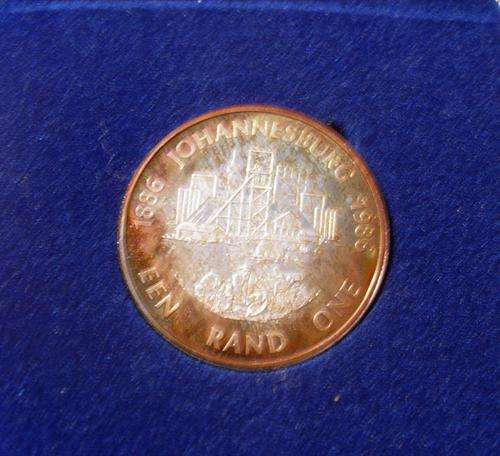 JOHANNESBURG WAS (100 years old )( 1886 TO 1986 ) R1 SILVER  COIN ( good selective toning )