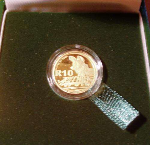 (  2012 LIMITED EDITION PROOF )  AFRICAN PAINTED WOLF....1/10oz... 24 carat GOLD