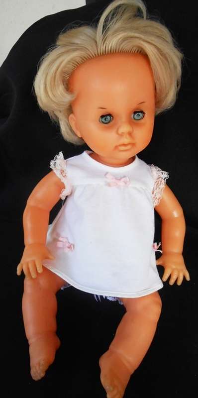 Collectable First Love Doll from 1978 in perfect condition with original dress.