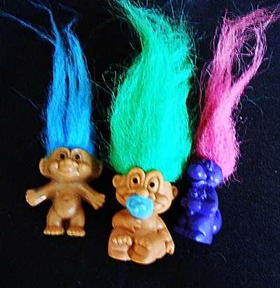three tiny Troll  figures