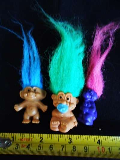 three tiny Troll  figures