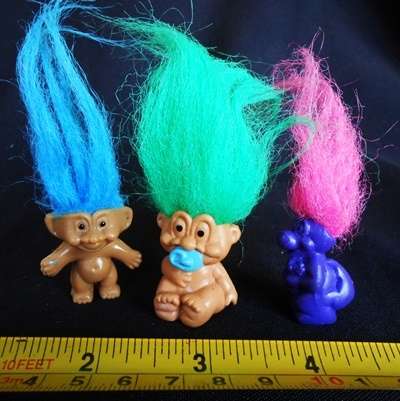 three tiny Troll  figures