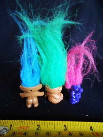 three tiny Troll  figures