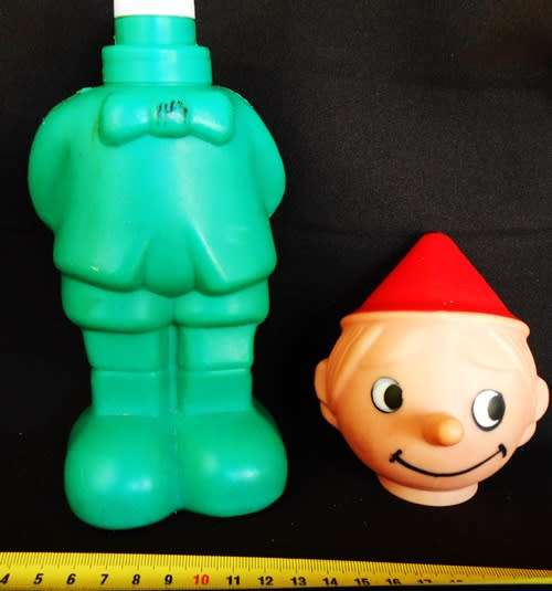 Pinocchio vintage hard plastic bottle