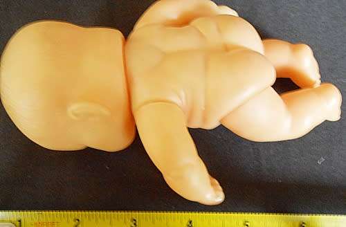 small chubby  baby boy doll