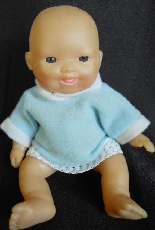 Small chubby baby doll looks like Berenguer doll with cute smile brown eyes
