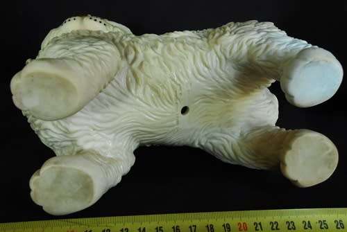 vintage 1960 s rubber puppy toy by Edward Mobley with sleep eyes.