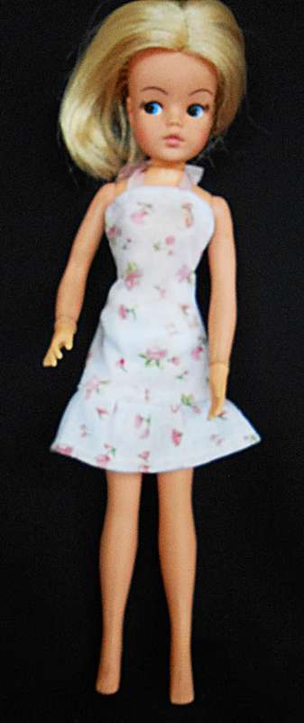 Collectable Vintage Sindy Doll with white and pink dress