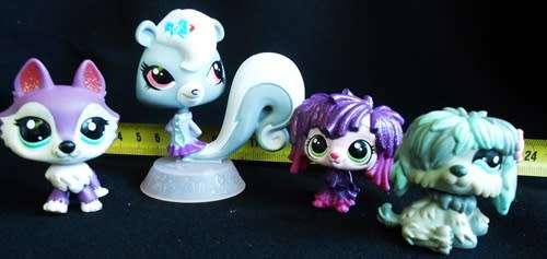 Collectable littlest pet shop figures. four characters