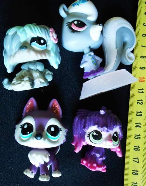 Collectable littlest pet shop figures. four characters