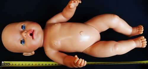 collectable Zapf Interactive Baby Born doll with dummy and rattle
