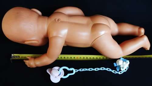 collectable Zapf Interactive Baby Born doll with dummy and rattle