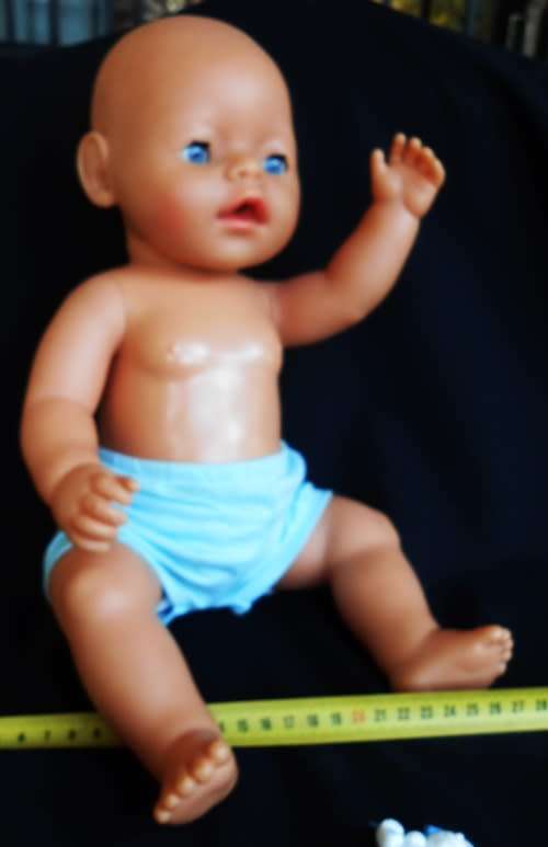 collectable Zapf Interactive Baby Born doll with dummy and rattle